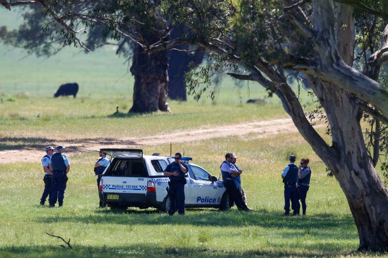 Tip offs led the police to search farmland for the fugitives.