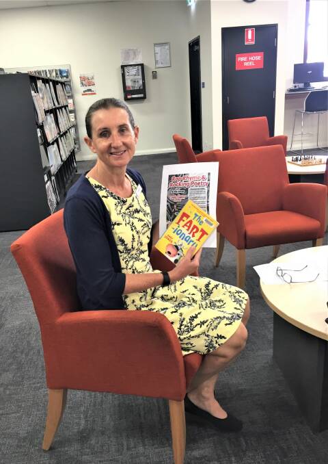 READY TO RHYME: Dubbo Library coordinator Melissa Tong with one of Andy Jones' most popular books. Photo: TAYLOR DODGE.