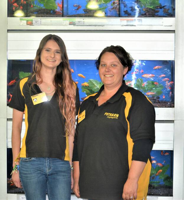 AQUA FUN: Petbarn Dubbo supervisor Lily Wilson and store manager Renay Armstrong. Photo: TAYLOR DODGE