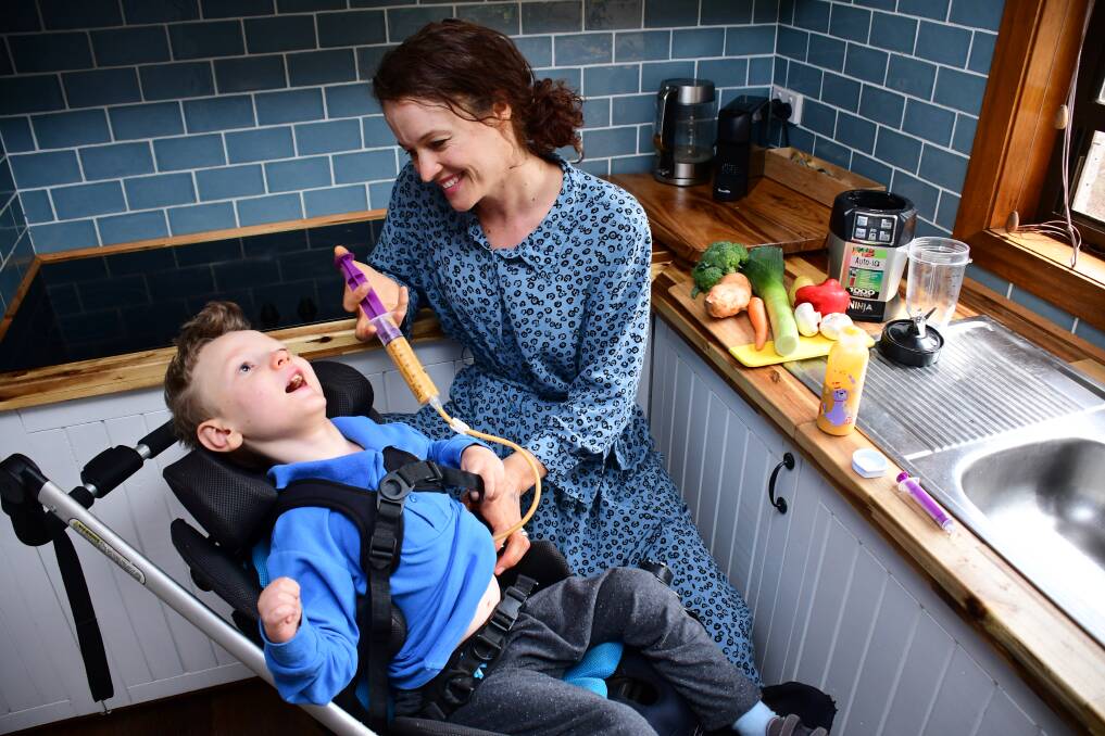 MOTHER AND SON BOND, LIKE NO OTHER: Max and his mum Amy McIntyre feeding him his vegetable soup. Photo: BELINDA SOOLE. 