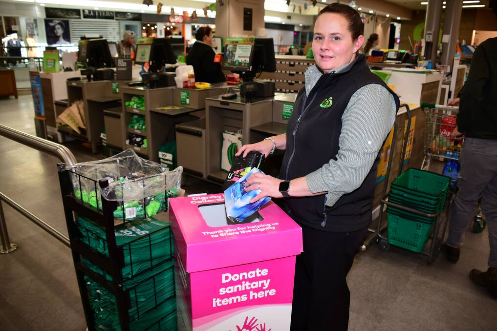 DONATING: Dubbo Woolworths Riverdale assistant store manager Candice Fell encourages the drive. Photo: BELINDA SOOLE.