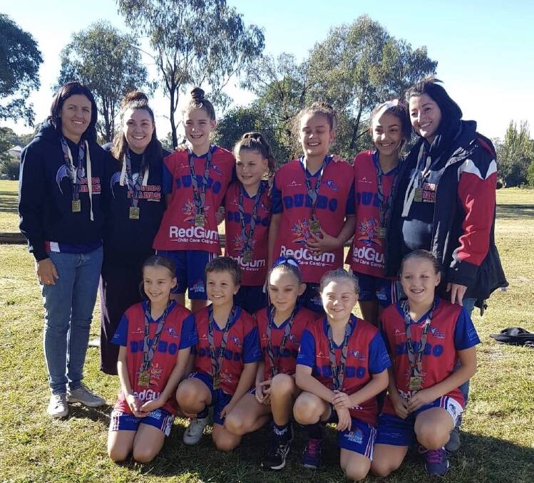UNDEFEATED: Manager Janelle Toshack, Assistant coach Gabi Herbert and coach Claire Hargreaves with the Under 12s Basketball girls. PHOTO CONTRIBUTED.