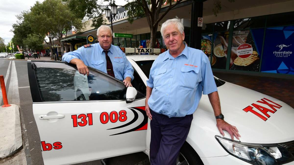 DELIVERIES AVAILABLE: NSW Taxi Council Dubbo Branch chairman Greg Collin and secretary Neil Donaldson. Photo: FILE.