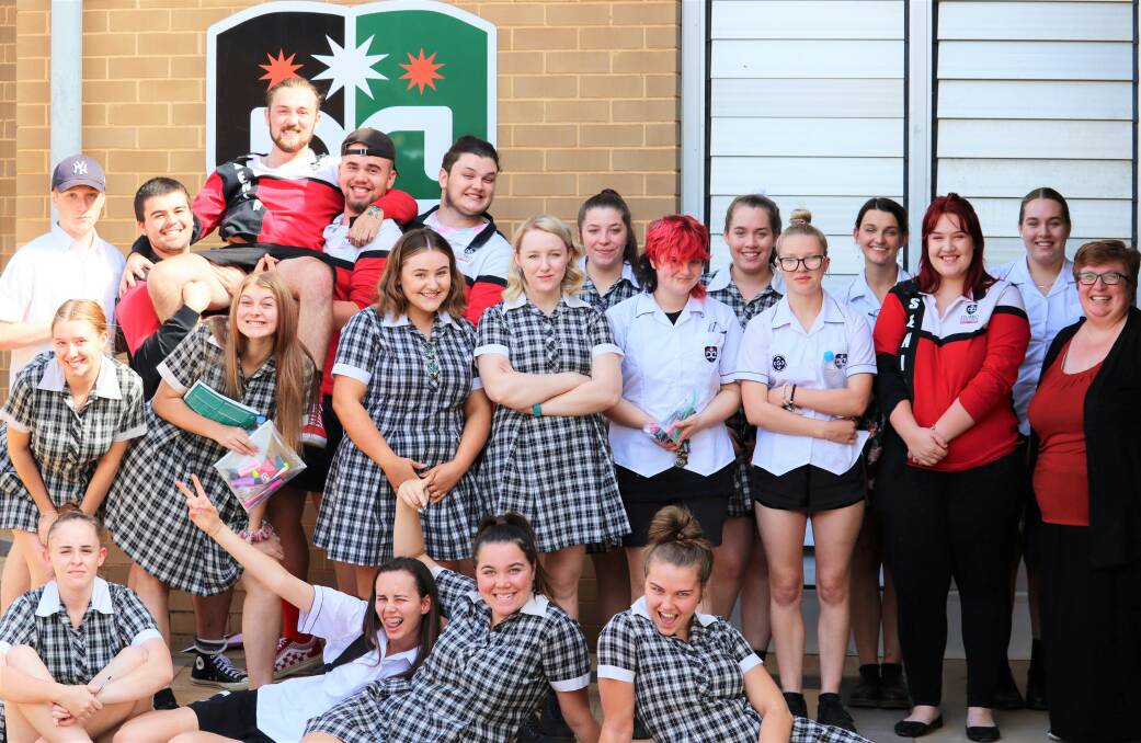 DONE, DUSTED: Year 12 Drama students with teacher Ms Kerrie Walters celebrating the end of the HSC exams. Photo: CONTRIBUTED. 