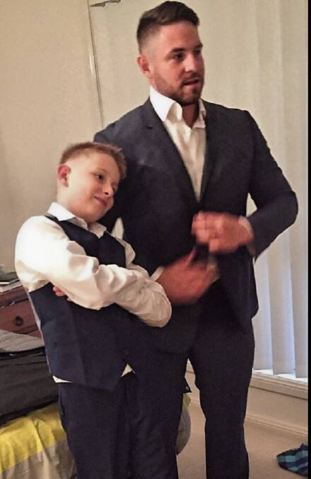 TUXEDO READY: David Hughes encourages his son Rusty to embrace his emotions and to always express how he's feeling. Photo: contributed by David Hughes.