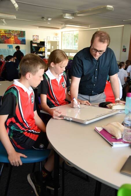 WOW: Year 7 Students Evan Nave and Amy Quilty with Mr Aaron Taylor. Photo: CONTRIBUTED. 