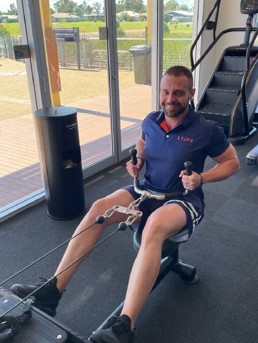 HOW IT'S DONE: Stepz Fitness Dubbo manager Scott Bouquet on the body rower. Photo: CONTRIBUTED. 