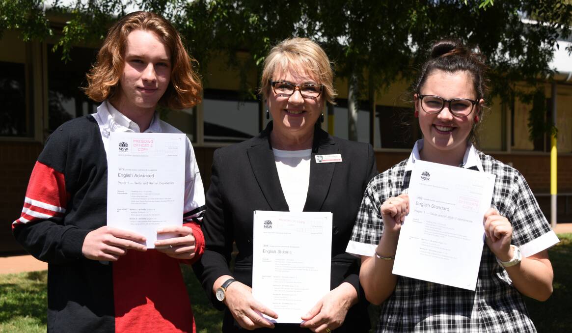 EXAM TIME: Year 12 English students Archie Purcell and Grace Gower with English Head Teacher Genelle Farquhar.