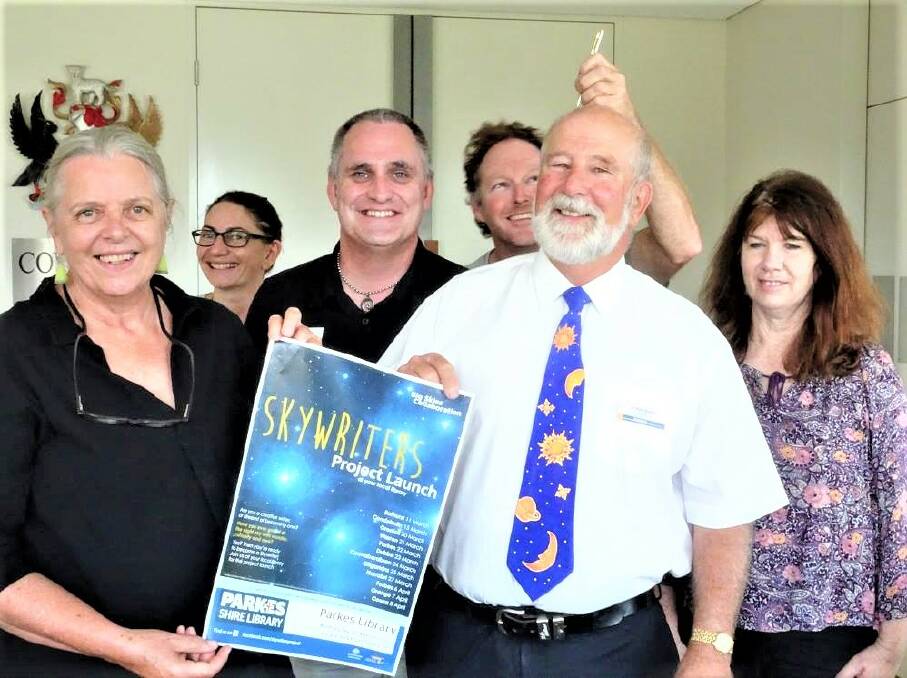  SKY STORIES: Merrill Findlay with Dr David Reiter and some of the contributors. Photo: CONTRIBUTED. 