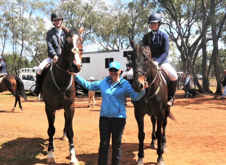 GIDDY UP: Dubbo riders Hannah Luffman and Ayla Ryan with club president Dale Frew. Photo: TAYLOR DODGE. 