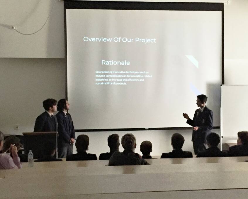 PRESENTING: Haider Ali, Ali Ridha and James Joseph conduct their research presentation. Photo: TAYLOR DODGE. 