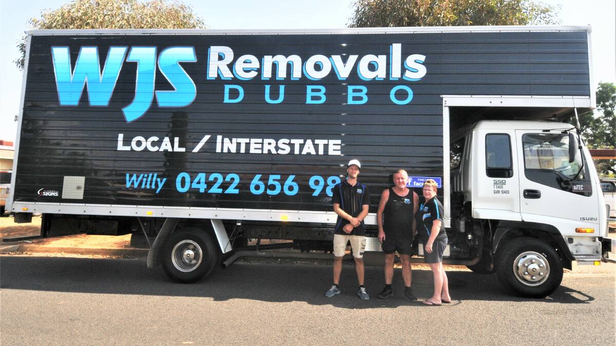 Good samaritans: WJS Removals' Willy and Margie Sowden with Dan Schulz ready to deliver donations from the Dubbo community to fire affected people. 