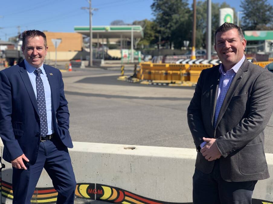 UPGRADING: Paul Toole with Dugald Saunders at the Newell Victoria Intersection. Photo: CONTRIBUTED. 