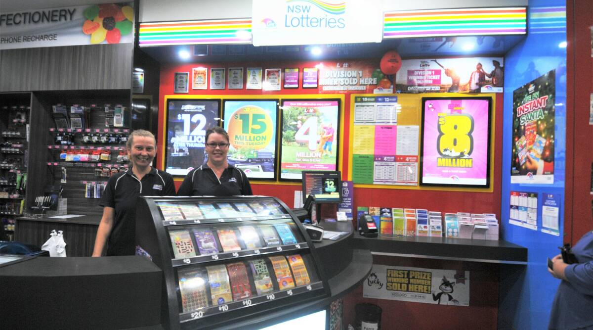 LOTTO WINNER: News at the Mall Dubbo employees Roslyn Blakemore and Vanessa Duce are in disbelief. Photo: TAYLOR DODGE.