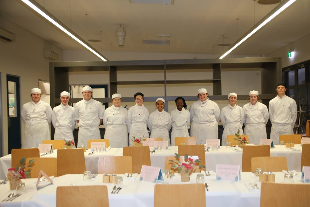 THREE-COURSE MEAL: St John's College year 12 hospitality students cook for their parents. Photo: CONTRIBUTED
