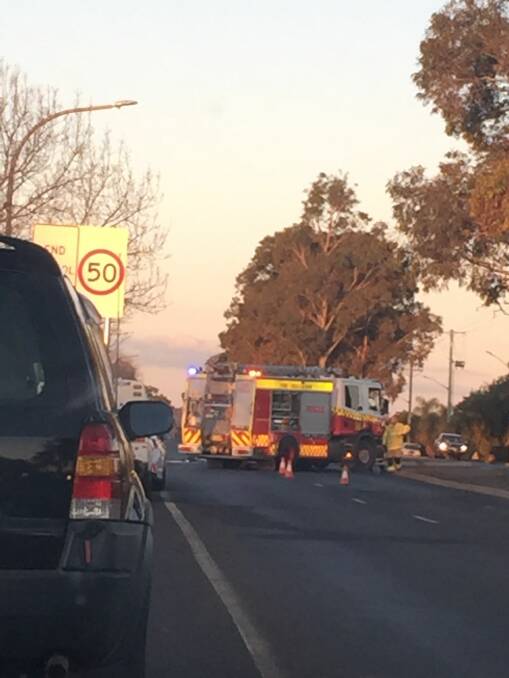 CAUTION: Emergency Services responded to reports of a three-car-collision. Photo: TAYLOR DODGE.