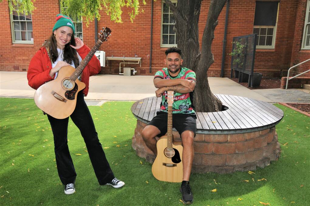 LOCKED IN: Local musicians Katie Thorn and Isaac Compton are ready to perform at Dubbo's upcoming NRL match at Apex Oval, following a competition by Dubbo Regional Council. Photo: TAYLOR DODGE