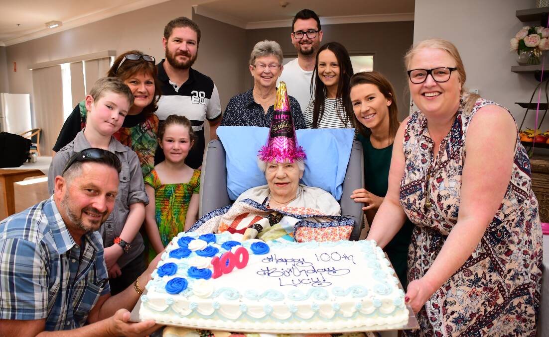 FAMILY AFFAIR: Florence Lucy Warnett surrounded by family and friends on her hundreth birthday. Photo: BELINDA SOOLE.
