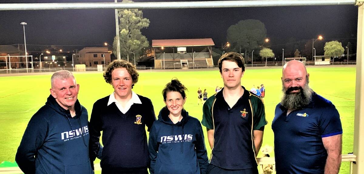 PROUD MOMENT: Michael Marshall, Kurt Eather, Katie Slattery, Danny Barber and Sean Eadie celebrate the boys' scholarships. Photo: CONTRIBUTED.