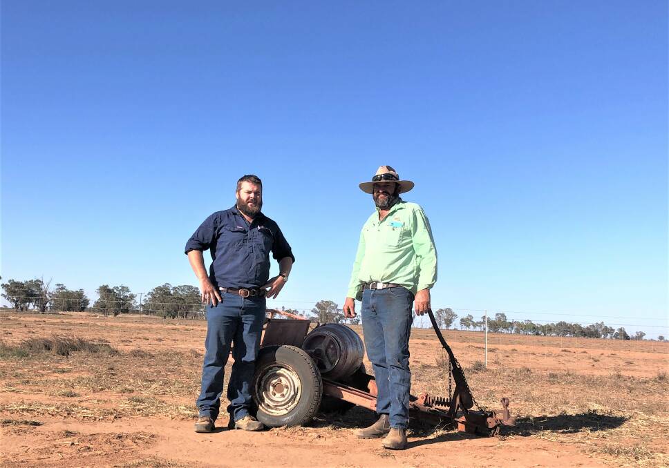 HUNTING RABBITS: Trangie farmer Peter Howe with Central West Local Land Services biosecurity officer John Ellis. Photo: CONTRIBUTED