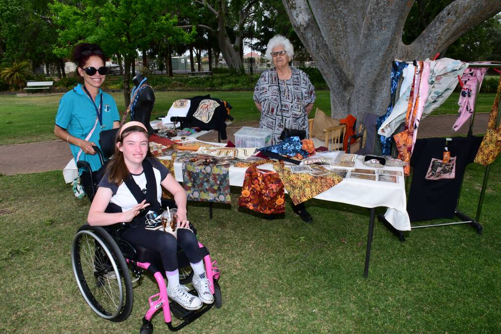 RAISING FUNDS: (Front) Sarah Everingham with Teresa Dodd and (back) Narelle Boys. Photo: AMY McINTYRE. 
