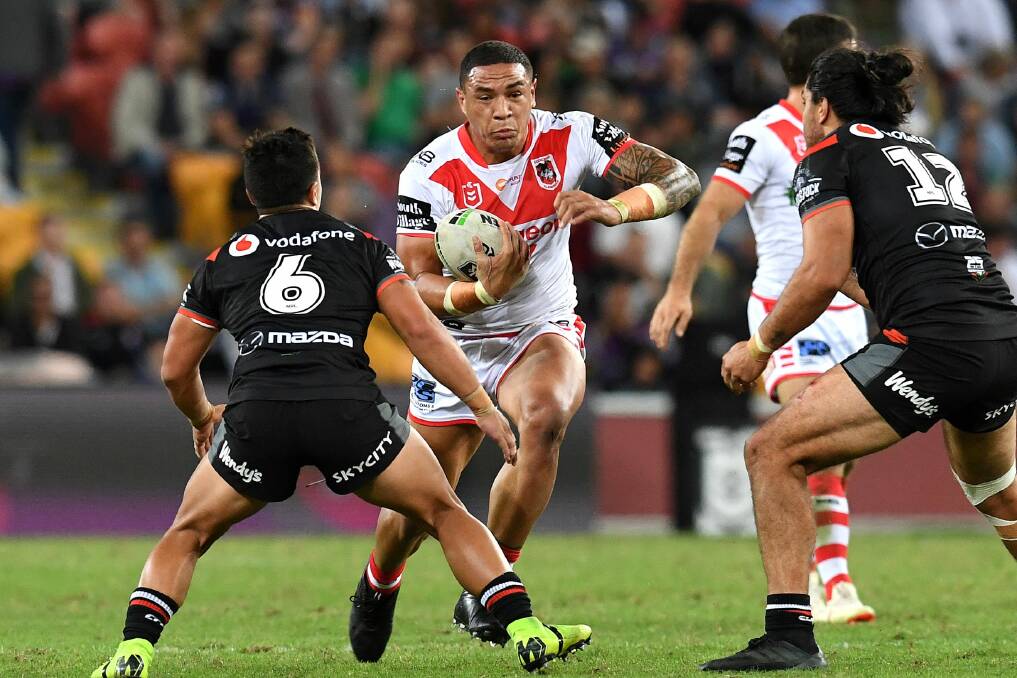 CHARGE: St George backrower Tyson Frizell charges into the Warriors defence. Photo: NRL PHOTOS