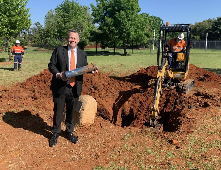 REUNITED: Mayor Ben Shields digs up capsule after 20 years in the ground. Photo: CONTRIBUTED. 