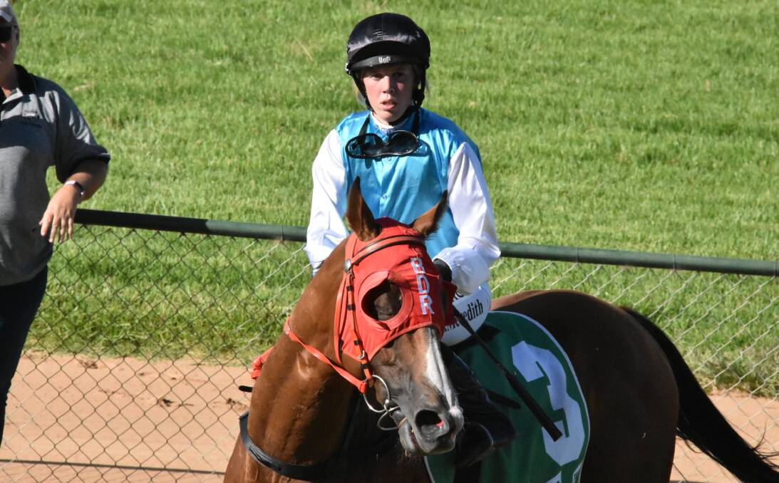Apprentice Elissa Meredith returns to scale on Bizarro ($13) after taking out the Cowra Diggers Cup on Monday.