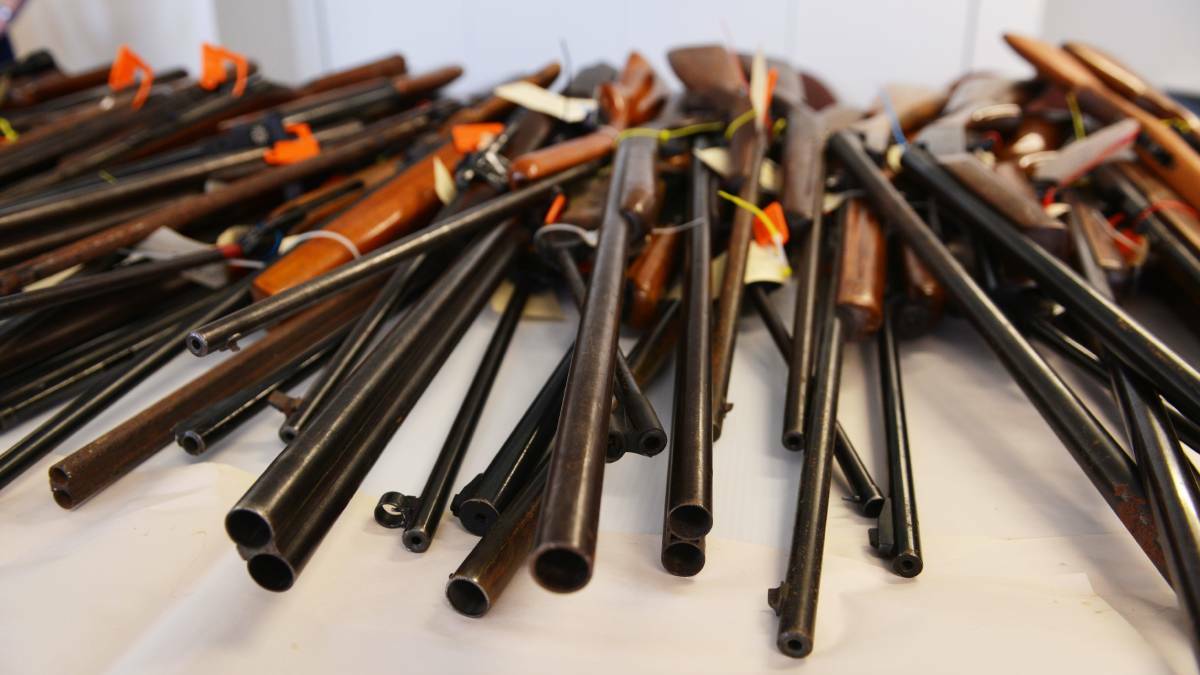 A generic photo of a pile of guns. Picture is from file