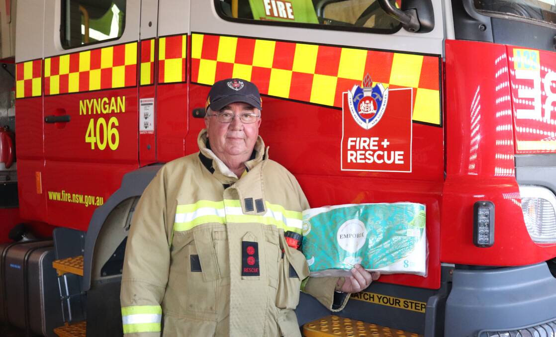 BE MINDFUL: Nyngan Fire and Rescue NSW captain Rob Avard is reminding people that stockpiling supplies is a fire hazard. Photo: Zaarkacha Marlan