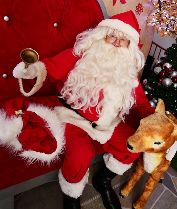 HO HO HO: Santa Claus has revealed a trimmed down diary for his shopping centre visits this Christmas. Photo: FILE