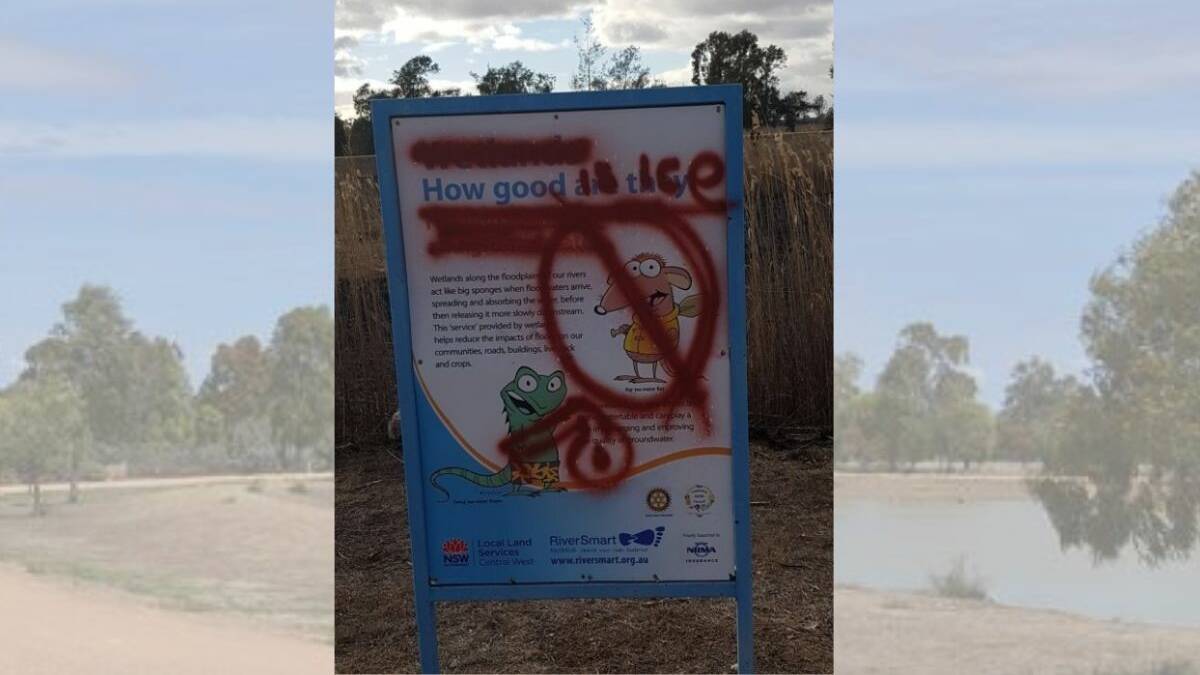 DEFACED: A photo of the vandalised sign at the Narromine Wetlands timestammped at 8.51am Saturday morning. Photo: CONTRIBUTED