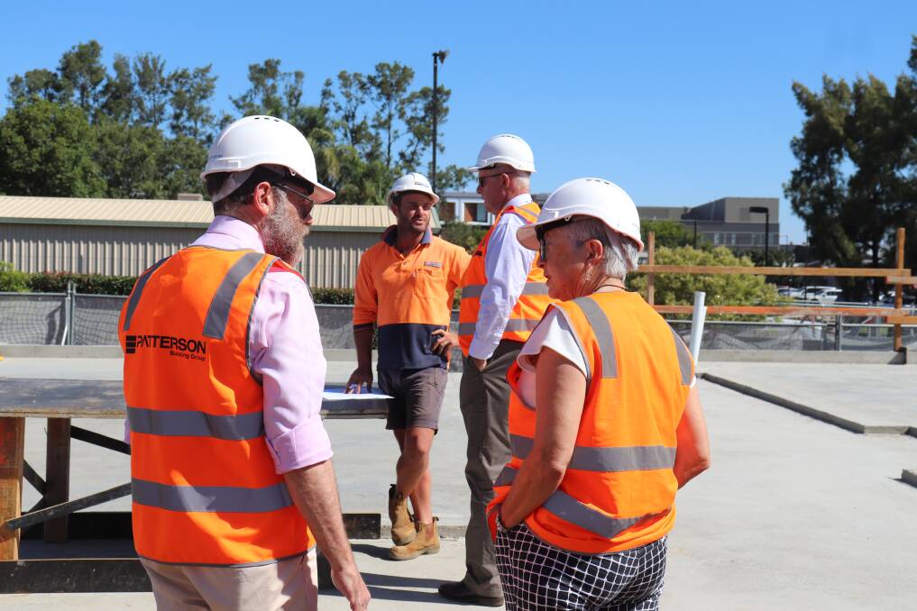 National Rural Health Commissioner Professor Ruth Stewart, University of Sydney School of Rural Health Associate Professor Mark Arnold, site manager Tim Gater and Minister for Regional Health Mark Coulton inspect progress on construction of the new medical school. Photo: ZAARKACHA MARLAN