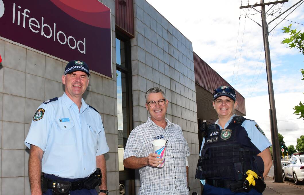 BLOOD BOOST: Senior constable Marty Paice, detective sergeant Mark Meredith and sergeant Jan Colbran on Friday. Photo: AMY McINTYRE
