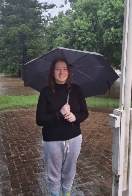 Lionel's eldest granddaughter Lily Young was committed to walking and was not prepared to let the excessive rain stop her. Photo: CONTRIBUTED