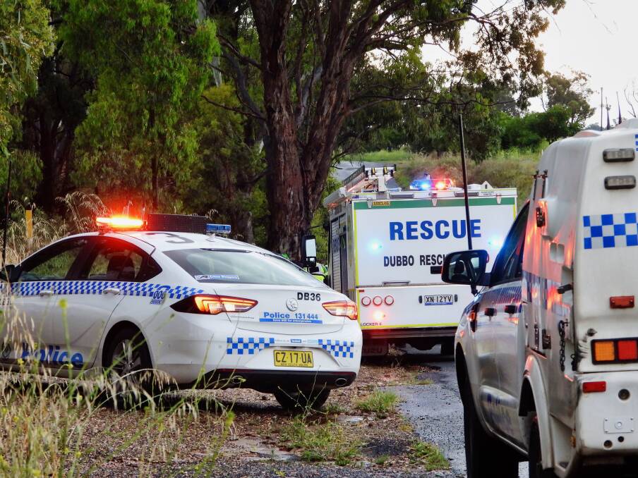 It's believed the man was trapped for some time before emergency services were able to release the man from the car. Photo: REGIONAL SPORT & NEWS