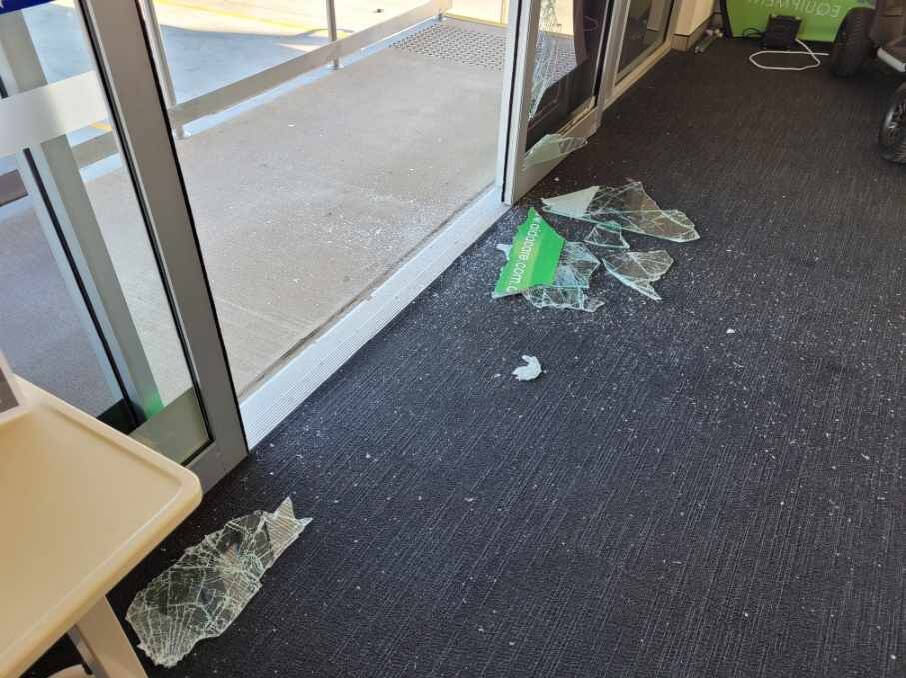 People managed to smash through the glass sliding doors at the front of the store. Photo: CONTRIBUTED