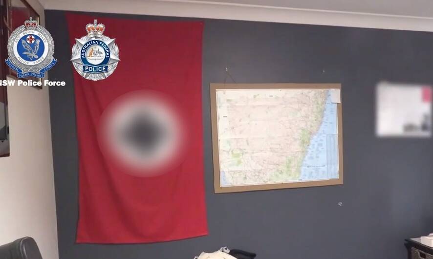 Footage provided by police shows a Nazi flag hanging in a bedroom of the property raided on Friday. Photo: NSW POLICE