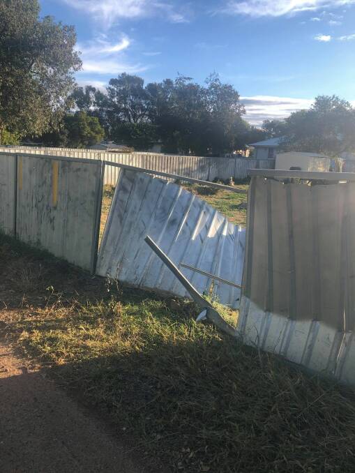A pursuit was initiated throughout the township of Narromine before police allege the vehicle crashed into a residential fence on Minore Street. Photo: CONTRIBUTED