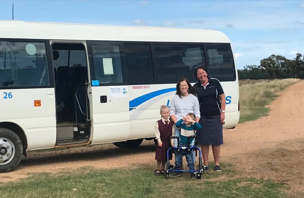 ABOVE AND BEYOND: Sarah Johnston and children Grace and Ted with driver Michelle Strickland from Langley's Coaches. Photo: CONTRIBUTED