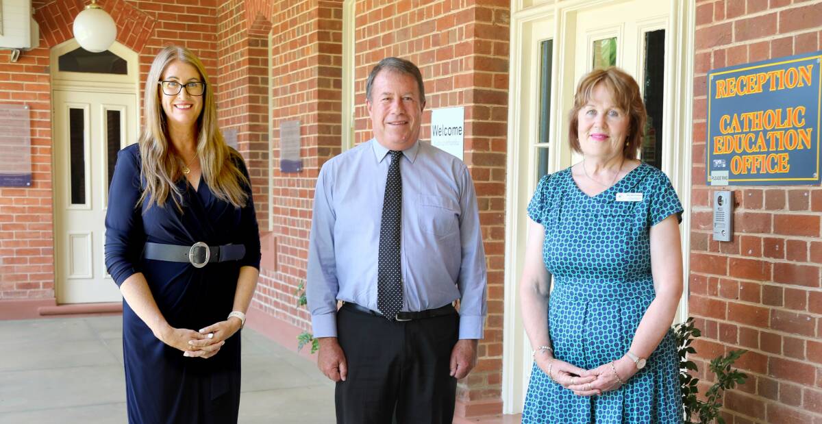OPPORTUNITIES: Carmen Walsh and Mary-Ellen Dempsey welcome Regional Director of Alphacrucis College Ken McCarron (centre) to the Catholic Education Office Forbes. Photo: CONTRIBUTED