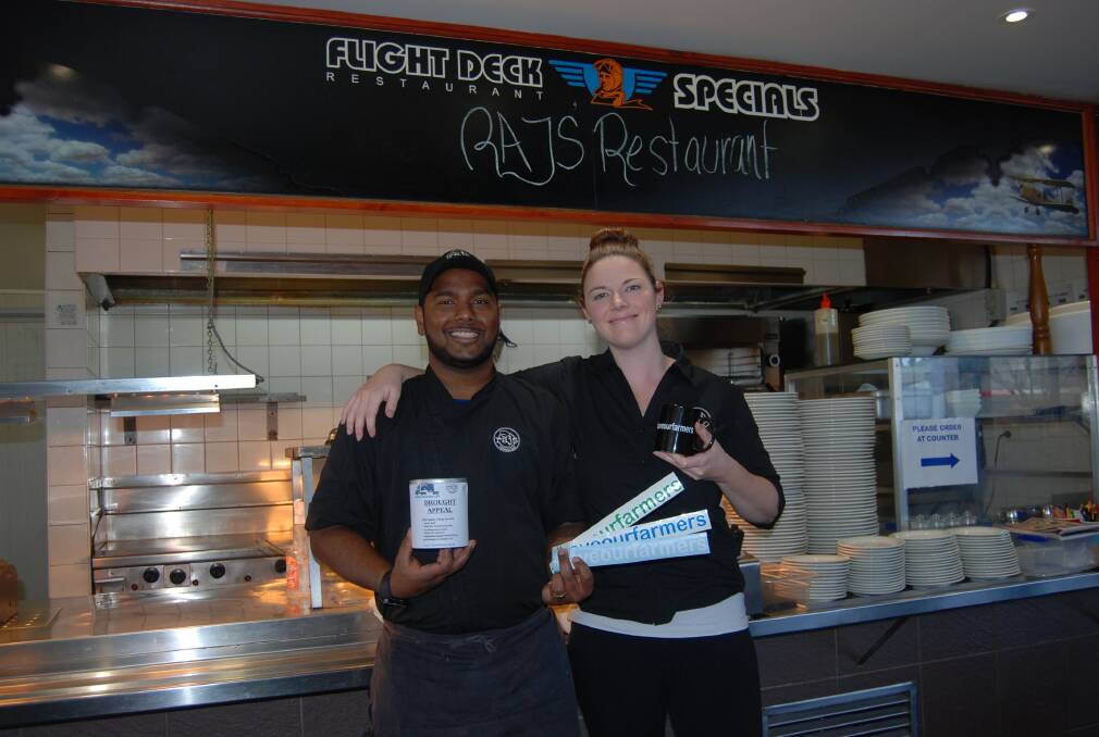 PARMA FOR A FARMER: Owners of Raj’s Restaurant in Narromine Stacey and Raj Swamy helping drought-sticken communities. Photo: ZAARKACHA MARLAN