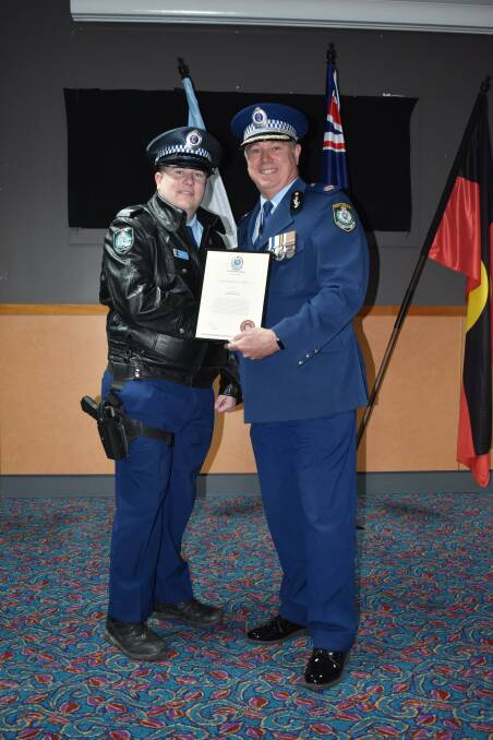 RECOGNISED: Constable Matthew Lang with superintendent Peter McKenna. Photo: NSW POLICE