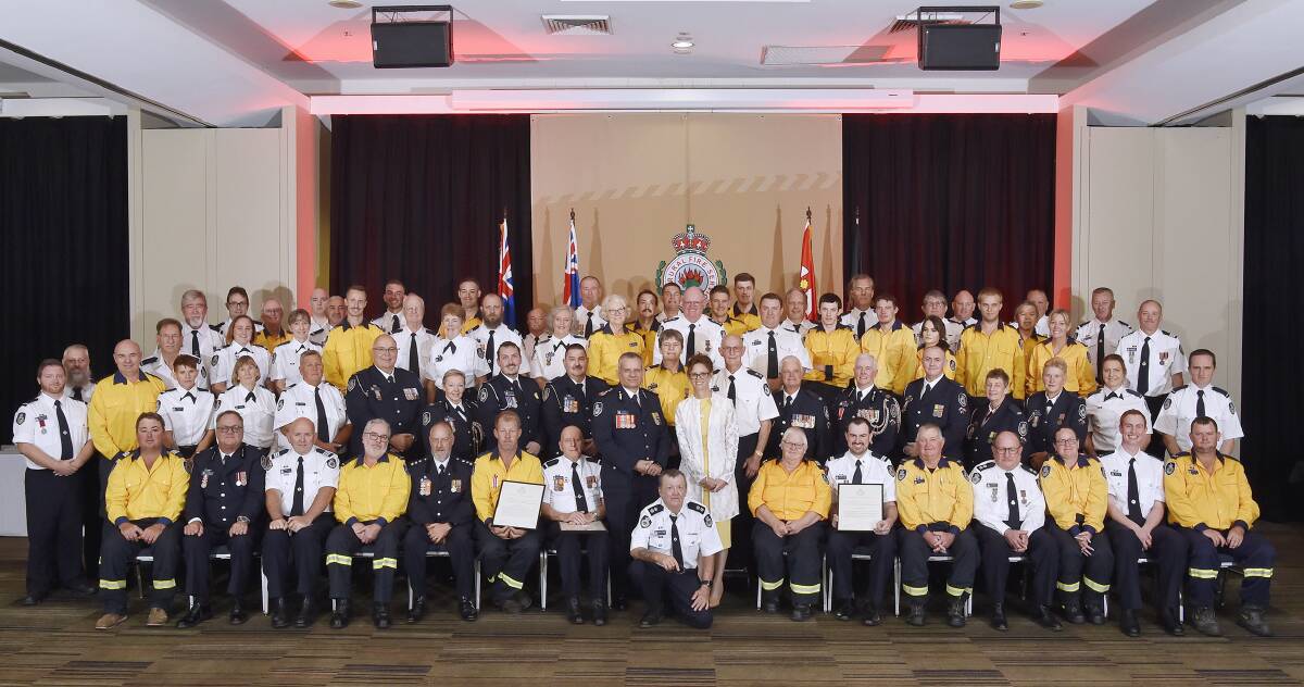From pulling a man from a burning building to delivering hampers for COVID-stricken communities, 19 NSW RFS staff, volunteers and teams have been honoured for their bravery and exceptional service. Photo: NSW RFS