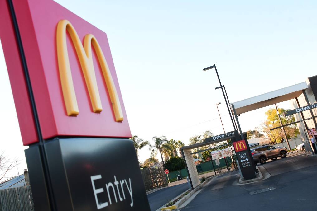 A McDonald's drive-through was damaged after a drunken Dubbo man woke up in a bus after a rugby trip 