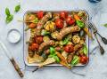 Winter vegetable and sausage tray-bake. Picture: Melissa Darr