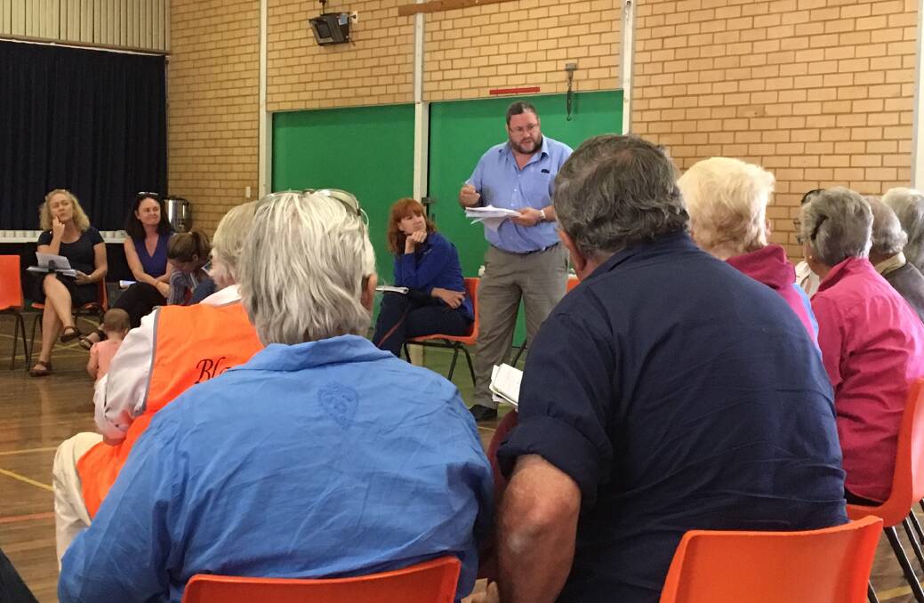 RECOVERY: Ken Harrison from the Department of Primary Industries spoke at Wednesday’s Sir Ivan Fire Recovery Public Meeting at Coolah. Photo: CONTRIBUTED