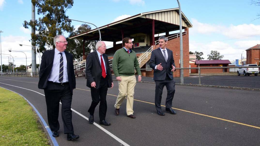 BIG NEWS: Dubbo Regional Council's Mark Riley, Michael Kneipp and Murray Wood discuss Victoria Park upgrades with Troy Grant (second from right). Photo: BELINDA SOOLE