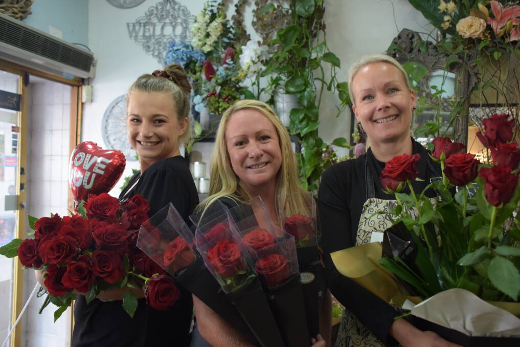Leah Morgan, Carmen Murphy and Linda Klein feeling the love at Hyams Florist on Junction Street, Nowra.