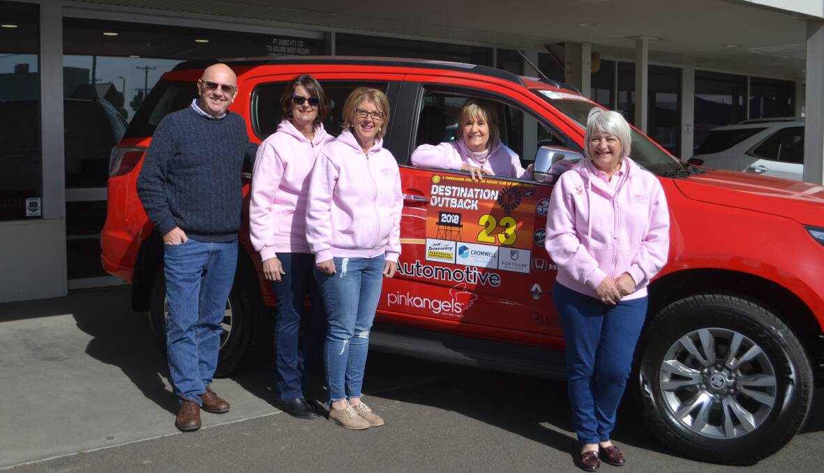Pink Angels: South Dubbo Rotary president Michael Adams with Donna Temesvary, Anne Gemmel, Sue Gavenlock and Julie Russell. Photo: Taylor Jurd.